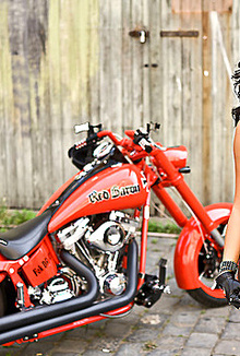 Tess posing naked on the bike