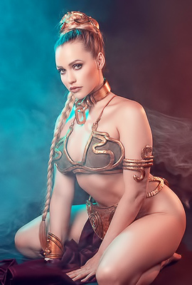 Mia Malkova displays her busty ass and enhanced boobs
