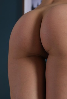 Melena A Shows Off Her Long Legs And Tattoo In A Tantalizing Bedroom Striptease