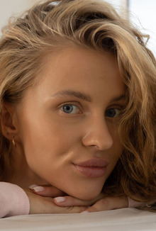 Vitalievna Parts Her Tanned Thighs