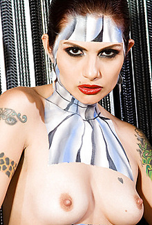 Artistic model Nikki Sebastian shows colorful body