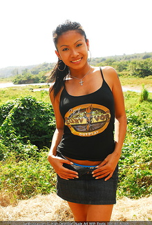 Busty asian model outdoor strips