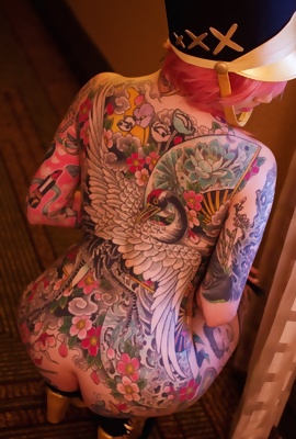Amazing asian babe with tattoos on all her body
