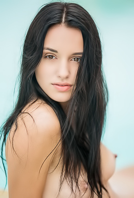 Sasha is wet, hot, and sexy naked in the pool