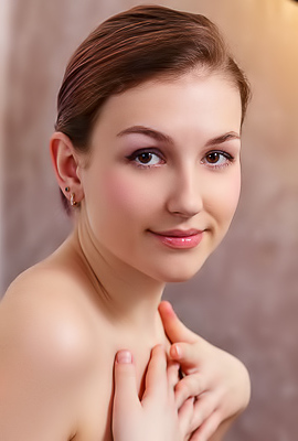 Isabele Parts Her Thighs To Frame Her Shaved Pussy