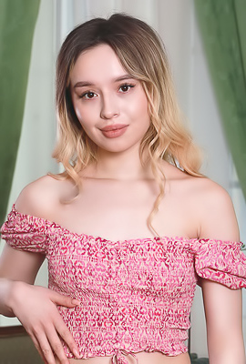 Mia Lamb Sits With Her Silky Thighs Parted To Frame Her Shaved Pussy