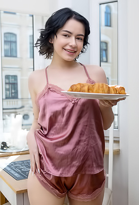 Baiba Rose-colored Silk Camisole That Skims Over Her Lovely Breasts
