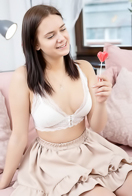 Tina Howl Flirty Look In Her Gorgeous Blue Eyes As She Sucks Her Lollipop