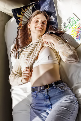 Marion Summers Warmed By The Sunshine Streaming Through The Windows