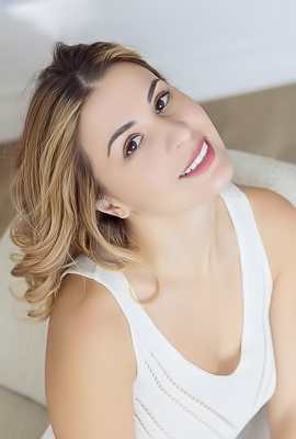 Alice Kelly Dark-eyed Siren Smiles Enticingly As The Straps Slide From Her Shoulders