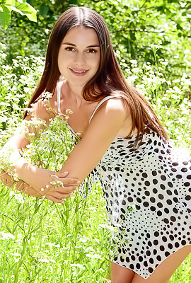 Alina Weaving Herself A Crown Of Flowers Before Letting Her Hands Wander Languidly