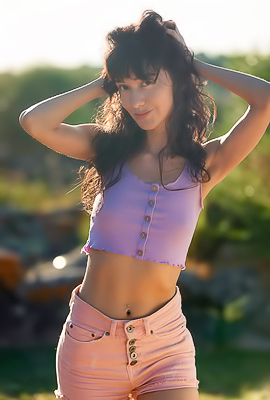 Violet Amrita Free-spirited American Beauty Reclines Naked On The Sun-warmed Rocks