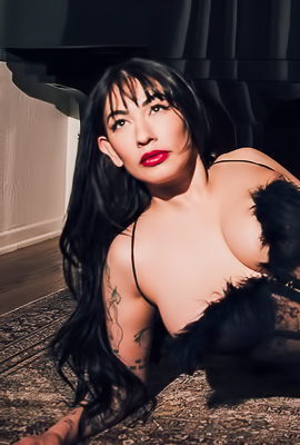 Sabina Teases with Lingerie and Black Wings, Kneeling Sensually by Piano