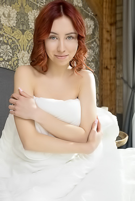 Rosalind Parts Her Slender Thighs To Frame Her Shaved Pussy