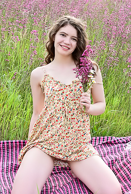 Carrie Rides Up To Expose Her Sexy Booty When She Stretches Out On A Blanket