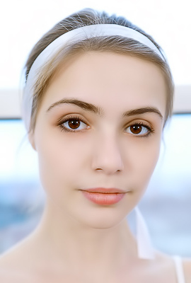 Elle Tan Dressed In A Frothy Pink Tutu And Cozy Leg Warmers