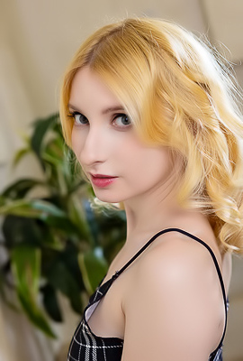 Minnie Lighter Squeezing Her Gorgeous Breasts And Smiles Seductively