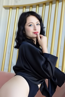 Anna Sugar Slowly Unveils Her Beauty And Shaved Pussy On A Couch