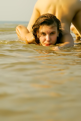 Deianira O Relishes The Frisson Of Water Lapping At Her Skinny Ass